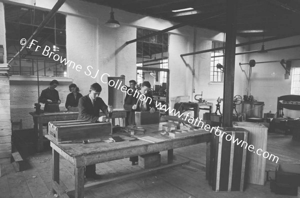 TRAVEL GOODS LTD IN FACTORY CUTTING FIBRE FOR SUITCASE FOLDING